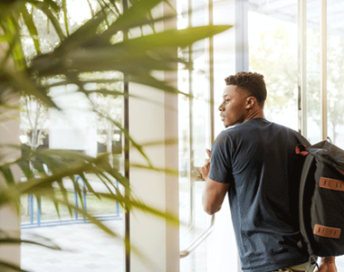 Student with rucksack