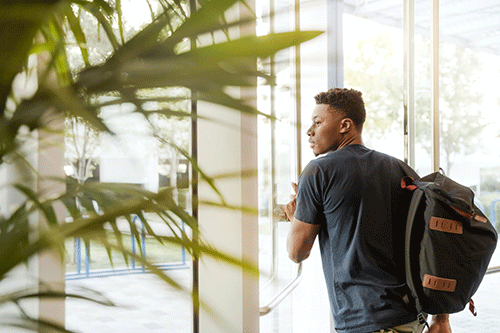 Student with rucksack
